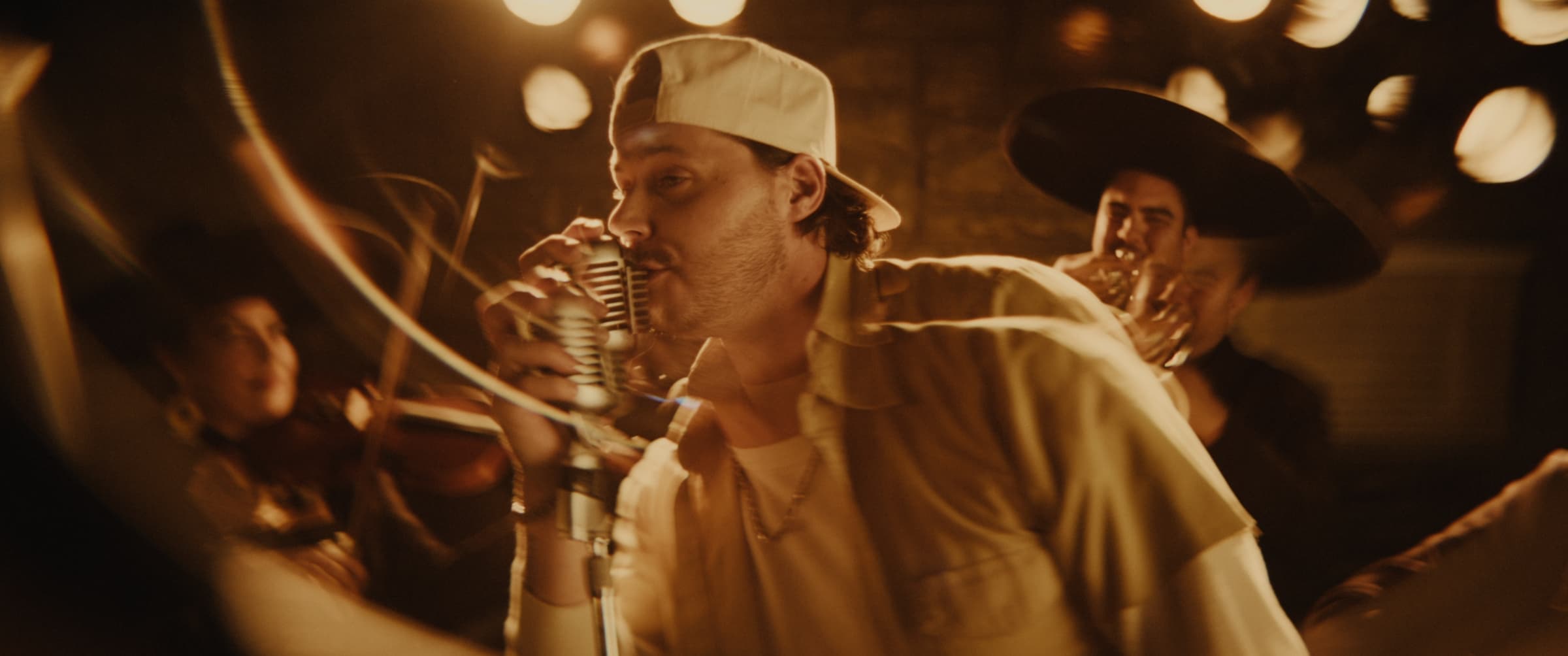 Late-night performance frame from the Later Tonight music film